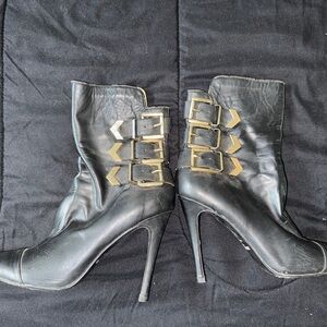Designer Black Heeled Boots with Gold Accents